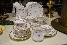 A selection of early 20th-century 'Rose' ceramic tableware, featuring a selection of delicate hand