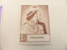 BRITISH EMPIRE GVI 1948 SILVER WEDDING STAMPS, PART COMPLETE MINT OMNIBUS Printed album with 28 sets