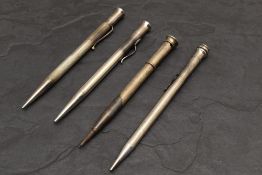 Four hallmarked Silver pencils. All engraved. 100g
