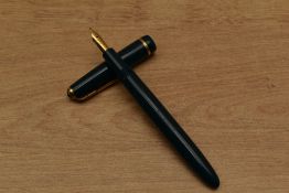 A Parker Duofold Slimfold aerometric fill fountain pen in Green with decorative cap band having