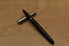 A Parker 51 Aerometric fill fountain pen in Black with lustraloy cap. Circa 1956