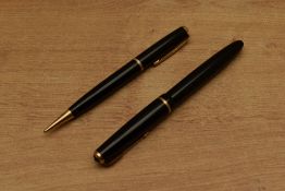 A Parker Duofold Junior Aerometric fill fountain pen and pencil set in Black with single