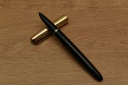 A Parker 51 Aerometric fill fountain pen in Forest Green with rolled gold converging line cap. Circa