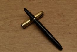 A Parker 51 Vacumatic fill fountain pen in Black with gold filled parallel line and spaced cap.