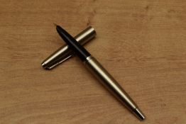 A Parker 45 Coronet cartridge fill fountain pen in Stainless Steel. Circa 1950