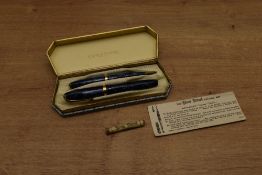 A boxed Conway Stewart No84 lever fill fountain pen and No26 Pencil in Blue Cracked Ice with Gold