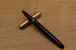 A Parker 51 vacumatic fill fountain pen in Dark Blue with Rolled Gold parallel lined cap. Some