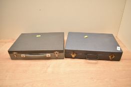 Two vinyl coated pen display cases