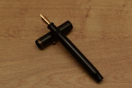 A Parker Duofold Senior button fill fountain pen in BHRwith single cap band having Parker USA 9 nib.