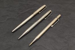 Three Yard O Led pencils one Sterling and two Hallmarked Silver. Two engraved. 71g