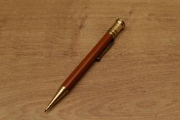 A Parker Duofold Senior Flat Top pencil in Red. Circa 1927. Slight ding