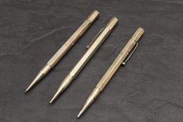 Three Yard O Led Hallmarked Silver hexagonal pencils. 75g. One engraved