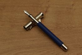 A Graf Von Faber-Castell Guilloche converter fill fountain pen in Indigo Blue with hinged clip