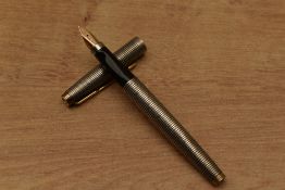 A Parker 75 cartridge fill fountain pen in Sterling Silver Cicele having Parker 14K Point USA nib.