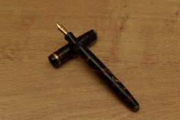 A Parker Duofold NS (new style) button fill fountain pen in Burgundy and Black marble with single