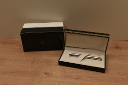 A boxed Montegrappa 1912 converter fill fountain pen in plain 925 sterling silver having Montegrappa