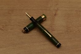 A Diamond Medal, Chicago lever fill fountain pen in Green Onyx with broad band to ring top cap