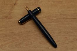 A Parker Duofold Junior aerometric fill fountain pen in Blue with a decorative cap band having