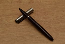 A Parker 51 Aerometric fill fountain pen in Burgundy with lustraloy cap. Some dents to cap