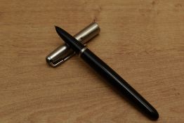 A Parker 51 Aerometric fill fountain pen in Black with lustraloy cap. Small dents to cap