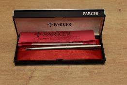 A boxed Parker 45 Flighter converter fill fountain pen with chrome tassie