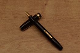 A Waterman 515 lever fill fountain pen in Black with single cap band Waterman 14K England 5 nib.