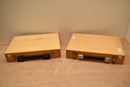 Two wooden pen display cases