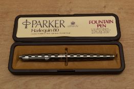 A boxed Parker 80 Harlequin converter fill fountain pen in Shield pattern