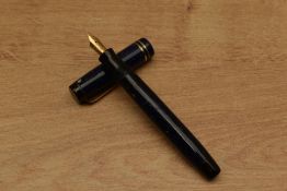 A Parker Junior Duofold streamlined button fill fountain pen in Lapis Lazuli with two cap bands