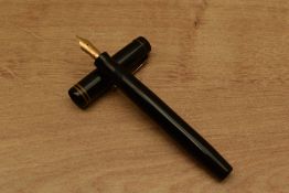 A Parker Duofold Junior Streamlined button filled fountain pen in Black with two cap bands having