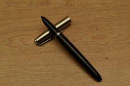 A Parker 21 Standard MkI aerometric fill fountain pen in Black with lustraloy cap. Circa 1949