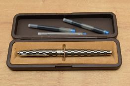 A boxed Parker 80 Harlequin converter fill fountain pen in Shield pattern