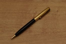 A Parker 51 pencil in Black with gold filled fine parallel lined cap. Circa 1955