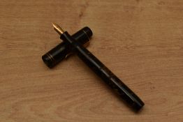An Unknown bulb fill fountain pen in Brown marble with two cap bands having Warrented 14ct 1st