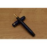 A Parker Duofold Junior streamlined button fill fountain pen in Lapis Lazuli with two cap bands