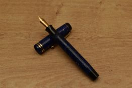 A Parker Duofold Junior streamlined button fill fountain pen in Lapis Lazuli with two cap bands