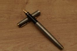 A Parker 75 cartridge fill fountain pen in Sterling Silver Cicele having Parker 585 France 14K