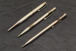 Two Hallmarked Silver and one Sterling Silver pencils. Two Yard O Led (one engraved) and an