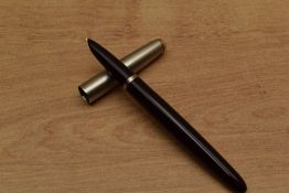 A Parker 51 aerometric fill fountain pen in Plum with lustraloy cap. Circa 1949