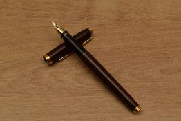 A Parker 75 converter fill fountain pen in Thuya Laque having Parker 14K 585 nib. Circa 1989
