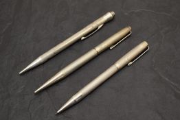 Three Silver pencils. Two engine turned Hallmarked Yard O Led and a Life Long Sterling Silver(