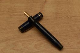 A Parker Junior streamlined button fill fountain pen in Lapis Lazuli with two cap bands having