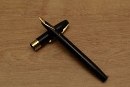 A Sheaffer Touchdown fill fountain pen in Black having gold fill trim with Sheaffer 14K nib