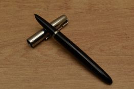 A Parker 51 Aerometric fill fountain pen in Black with a lustraloy cap. Circa 1948. Engraved