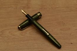 A Conway Stewart Conway 93 lever fill fountain pen in Green Chevron pattern with two narrow and