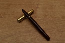 A Parker 51 vacumatic fill fountain pen in Cordovan Brown, twin jewel with gold filled fine line and