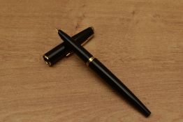A Parker 45 converter fill fountain pen in Black. Circa 1960. Some marks to the cap