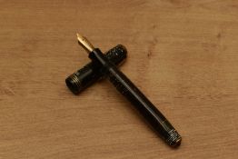 A Parker Vacumatic Senior lockdown button fill fountain pen in Grey Pearl with three cap bands