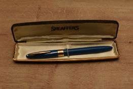 A boxed Sheaffer Valliant Touchdown fill fountain pen in Blue having Sheaffer Palladium Silver
