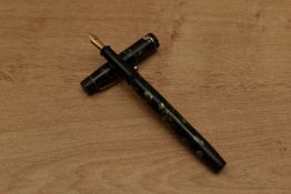 A De La Rue Onoto 5601 plunger fill fountain pen in Green and Black marble with single cap band